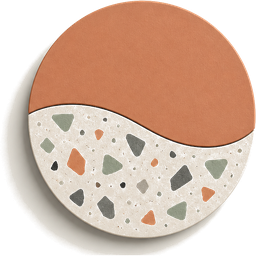 Emblème Jesmonite Kit : galet rond, moitié terracotta lisse et moitié terrazzo crème moucheté de vert et d'orange